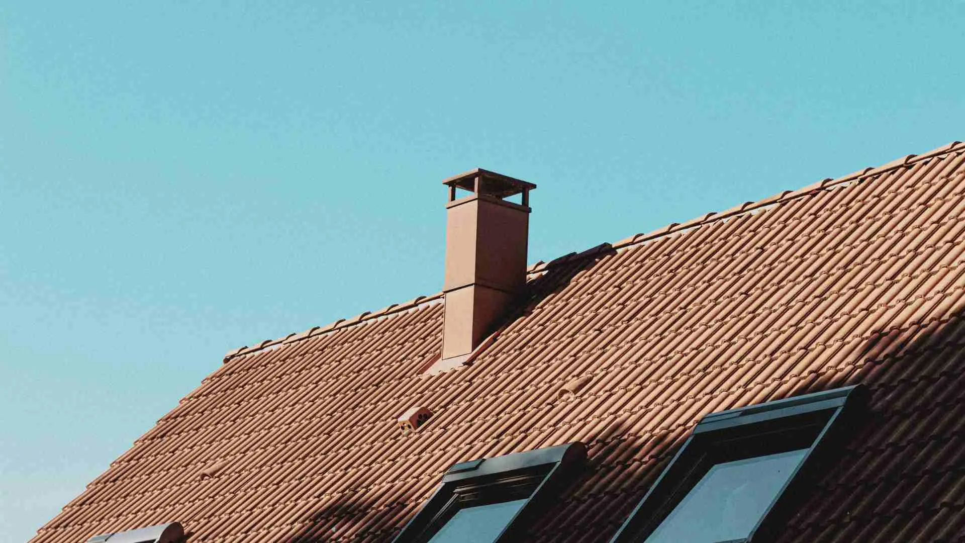 How to Pick a Roof and Facade That Age Well Together