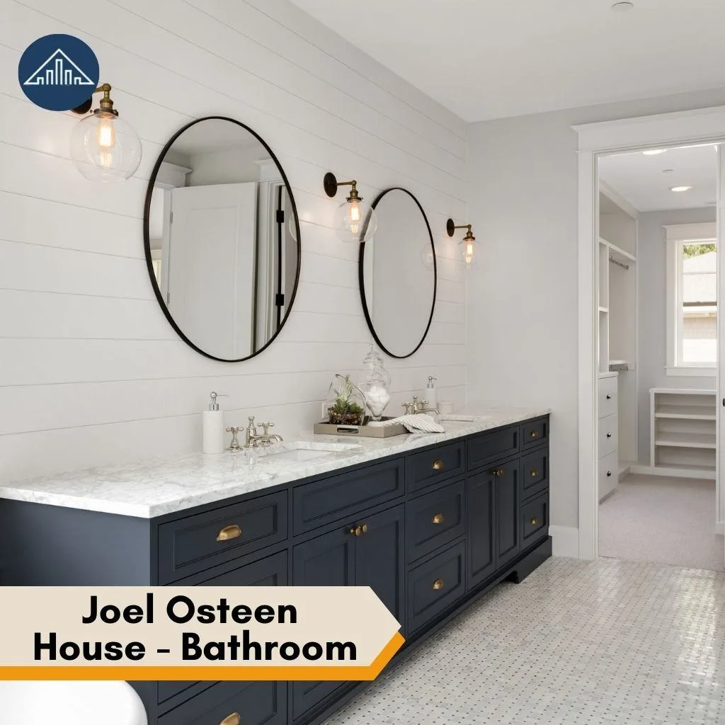 A spacious bathroom with double vanity and navy cabinets inside a luxurious Joel Osteen House.