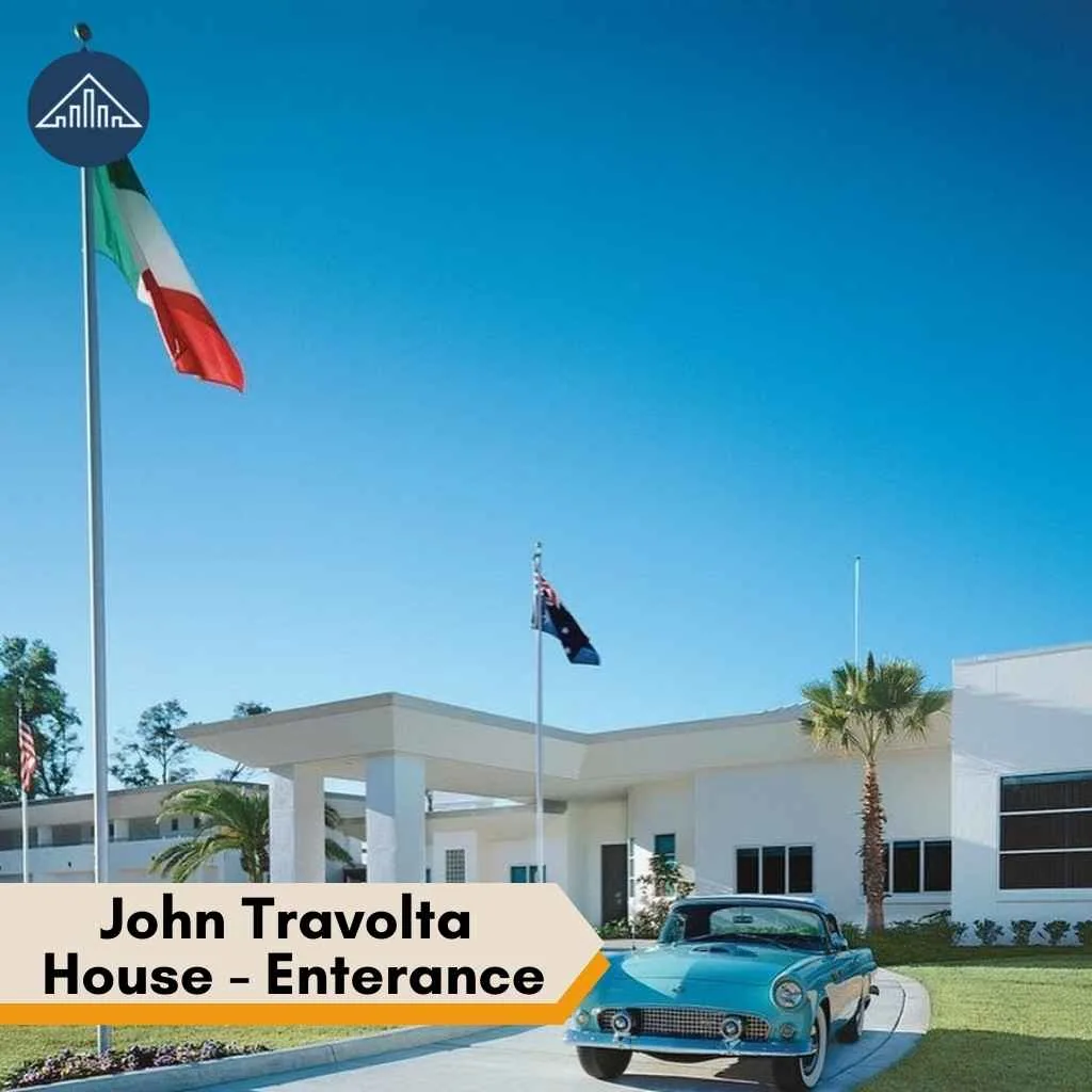 A classic turquoise vintage car parked in the circular driveway of the modern John Travolta house.