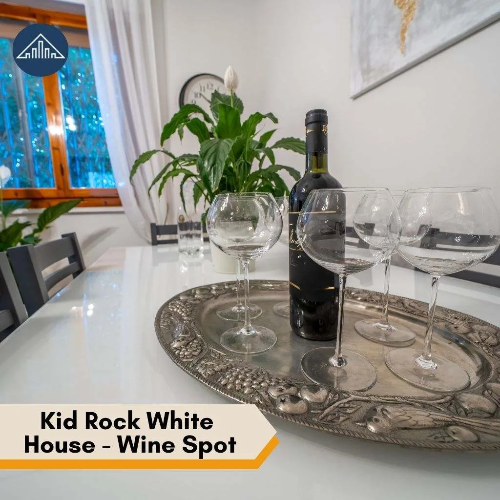 A silver platter with wine and glasses at the Kid Rock White House wine spot.
