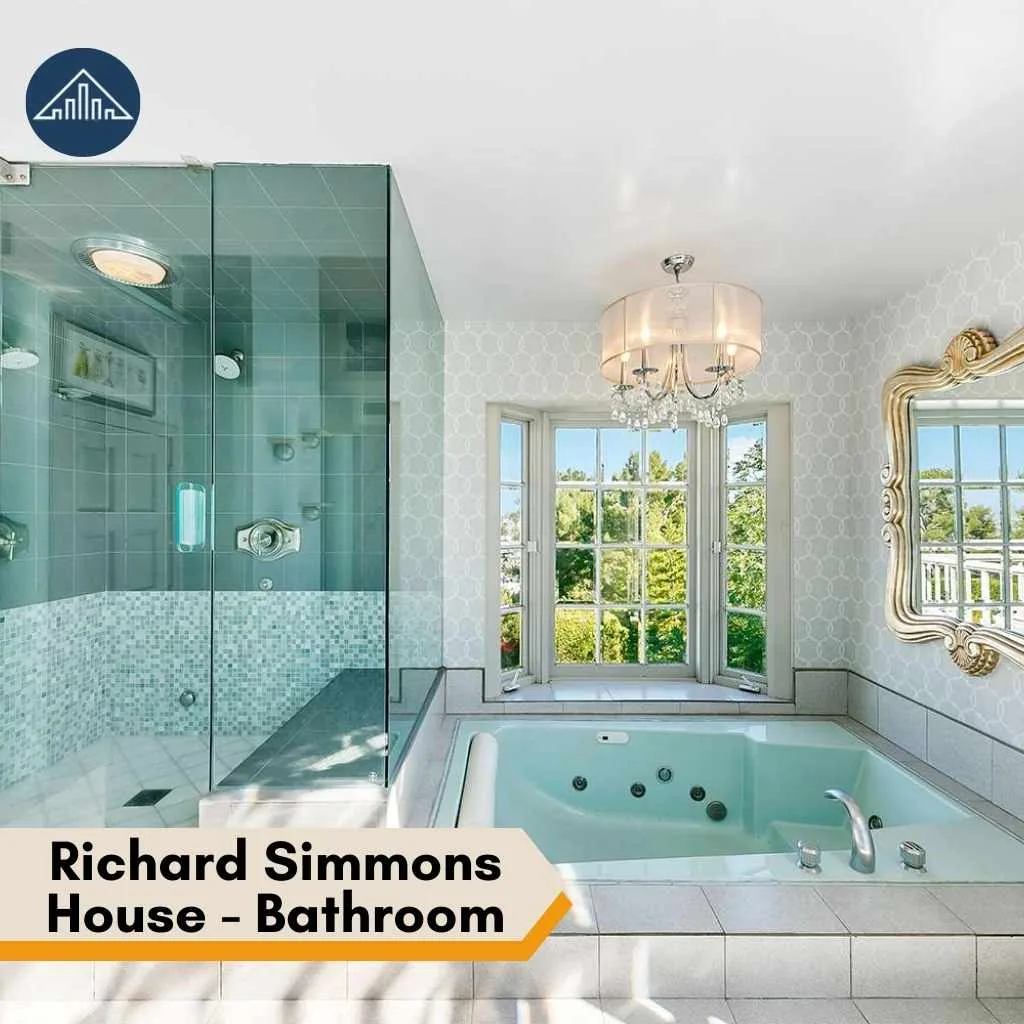 A luxurious bathroom in the Richard Simmons House featuring a glass shower and large soaking tub.
