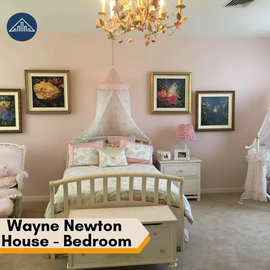 Wayne Newton House: Inside Casa de Shenandoah Estate 2026 4 An elegant pink children's bedroom inside the Wayne Newton House featuring floral art and a canopy.
