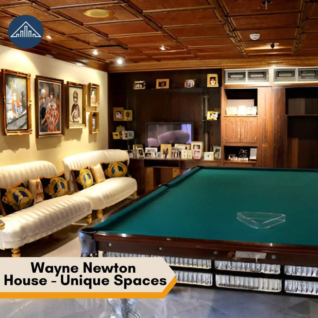 Wayne Newton House: Inside Casa de Shenandoah Estate 2026 6 A wood-paneled entertainment room inside the Wayne Newton House featuring a large green billiard pool table.