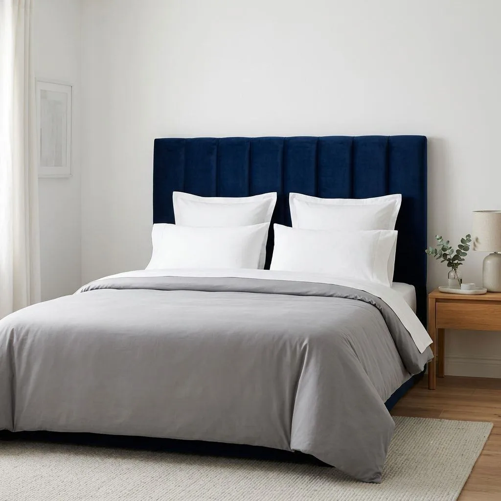 15 Navy Blue Bedroom Ideas That'll Make You Never Want to Leave Your Room 5 Navy Blue Velvet Headboard Statement