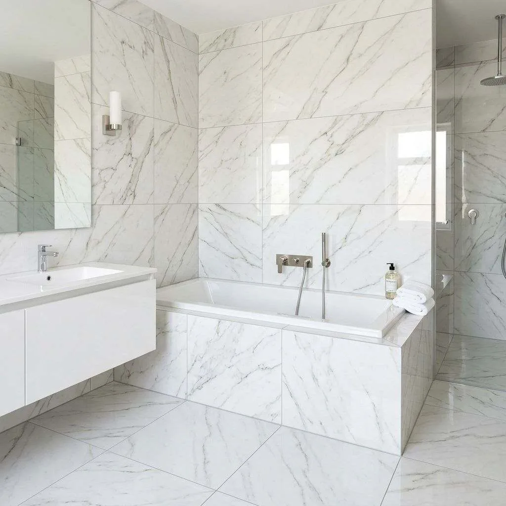 15 White Tile Bathroom Ideas to Transform Your Space 8 White Marble-Look Porcelain Tiles
